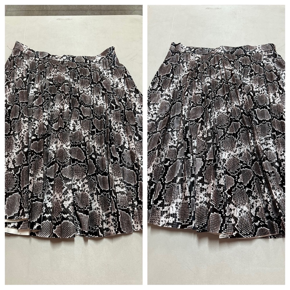NWT GRACIA leopard print Skirt size L
50% PU 50% Polyester
B327